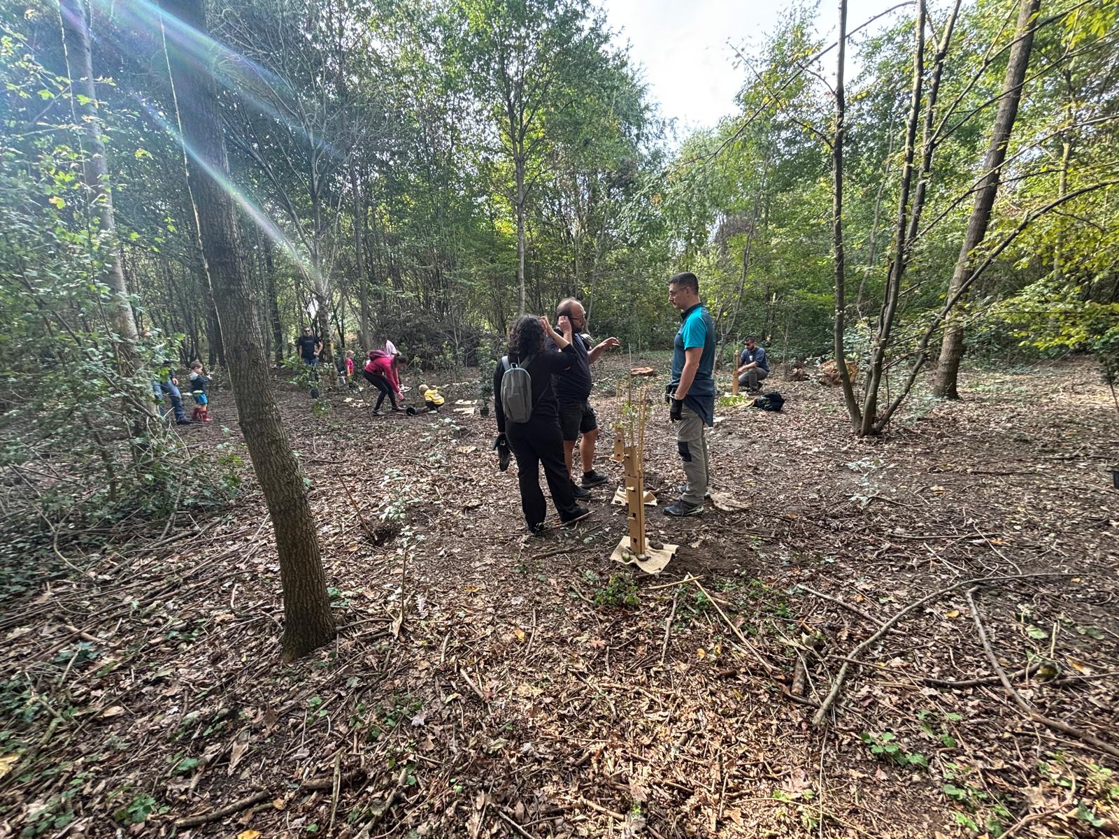 Participants at the completed planting site
